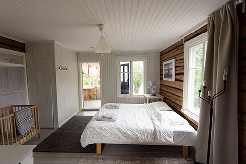 A large bed and breakfast room decorated in nordic style